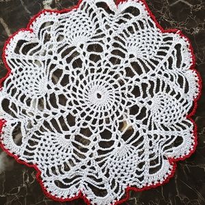 White Doily with a Red Trim